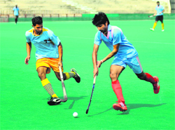 Players in action during the Inter-College Hockey Championship at Hockey Stadium in Sector 42, Chandigarh, on Saturday.