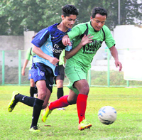 A match in progress in the Lala Nemidass Memorial Dehradun District Football League played at Pavillion Ground in Dehradun on Saturday.