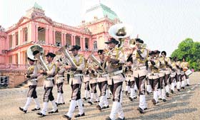 Students of Sainik School, Kapurthala, perform a band display on the campus
