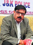 Ashok Prasad, Director General of Police, addresses mediapersons at the police headquarters in Srinagar on Saturday. 
