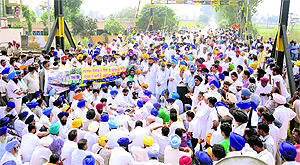 Residents hold a protest at the railway station in Samrala on Saturday