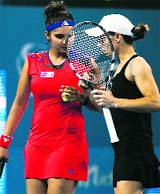 Sania Mirza and Cara Black beat Vera Dushevina and Arantxa Parra Santonja 6-2, 6-2 in the China Open final.