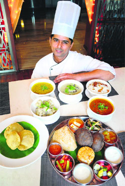 Chef Naveen Handa with the culinary spread