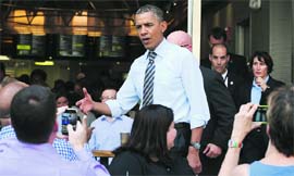 President Obama greets people in Washington, DC, on Friday.