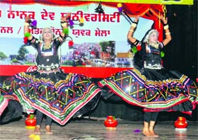 Students perfom a dance during the Zonal Youth Festival at Guru Nanak Dev University in Amritsar on Sunday.