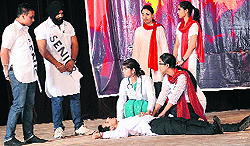 Students enact a scene from the play Ragging-ek abhishap