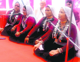 Basanti Bisht along with her troupe performs in Mussoorie on Sunday.