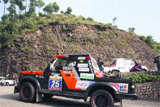A participant on the way during the 15th Raid de Himalayas car rally in Shimla on Sunday. 