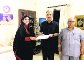 MLC Dr Shehnaz Ganai with Union Health Minister Ghulam Nabi Azad in New Delhi on Sunday
