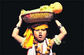 A child participates in a fancy dress competition at the General Zorawar Singh Auditorium in Jammu on Sunday