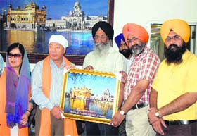 Ambassador of Taiwan Chung Kwang Tien being felicitated by SGPC officials at the Golden Temple in Amritsar on Monday