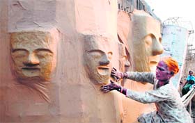 Dasehra celebrations: A woman prepares effigies of Raavan, Kumbhkaran and Meghnad in Amritsar on Monday