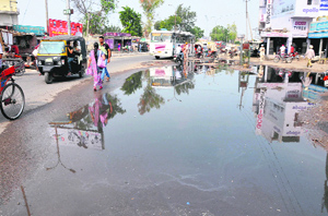 Sewerage water accumulated near Fauji Chowk in Bathinda on Monday.