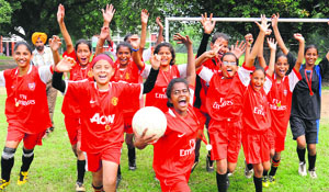 Members of the GMSSS-22 team rejoice after winning the final match of an inter-school football championship in Chandigarh on Monday. 