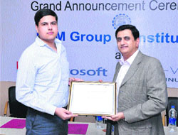 Himanshu Chawla, Director of Microsoft, hands over the Platinum Certification to Chitresh Lather, CEO of the PDM Group of Institutions, during a function at Bahadurgarh in Jhajjar.