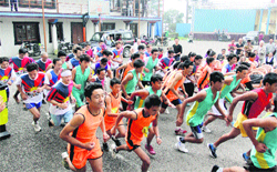 Tibetans participate in a half-marathon Run for Tibet at Tippa in McLeodganj on Monday. Photo: Kamaljeet