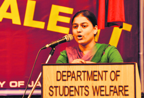A student participates in a debate competition at the University of Jammu on Monday.