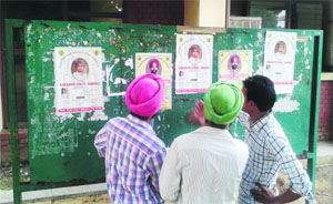 Posters of both the groups pasted on the notice board.