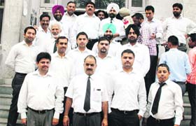 Lawyers hold a protest in Amritsar on Tuesday