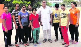 The winners of the third edition of the World Kabaddi Cup along with their coach Kulwinder Singh in Bathinda on Tuesday.