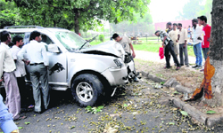 A damaged car after it rammed into a tree at Sector 35 in Chandigarh on Tuesday. A youth was injured in the accident.