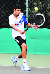 Digvijay Partap Singh returns a shot during the AITA Super Series Tournament at the CLTA courts on Tuesday. 
