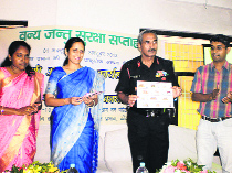 Brigadier and Commandant of Garhwal Rifles Vinod Raizada releases two folders on the bird species at Kotdwar, Pauri Garhwal, on Monday.