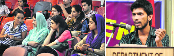 Students wait for their turn during the poetry recitation competition, and (right) a participant performs at the Display Your Talent contest at the University of Jammu on Tuesday. 