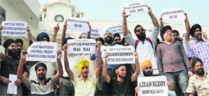 Members of the J&K Sikh Council stage protest in Jammu on Tuesday. 