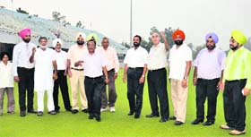 Volunteers of Surjit Hockey Society inspect the last-minute preparations at the Olympian Surjit Singh Stadium in Burlton Park.