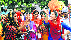 Students take part in a procession during the inter-college youth festival at GADVASU in Ludhiana on Tuesday