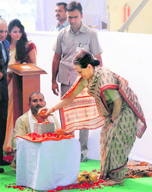 UPA chairperson Sonia Gandhi at the foundation stone laying ceremony of the Forged Rail Wheel Factory in Raebareli on Tuesday. 