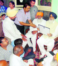 Chief Minister Parkash Singh Badal at deceased Vidhu Jains house in Malerkotla on Tuesday.