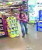 A file photo of a gun-totting terrorist inside a Kenyan mall.