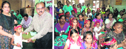 Officials honour a girl child during a function in Amritsar on Wednesday; and (right) people attend the programme. Tribune photos