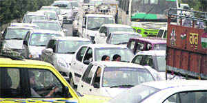 Vehicles caught in a traffic jam near PAP Chowk during the visit of Chief Minister Parkash Singh Badal in Jalandhar on Wednesday.