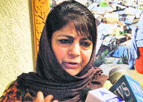 PDP president Mehbooba Mufti talks to mediapersons in Srinagar on Wednesday