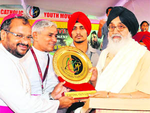 Chief Minister Parkash Singh Badal being felicitated by Christian clerics at Trinity College, Jalandhar, on Wednesday. 
