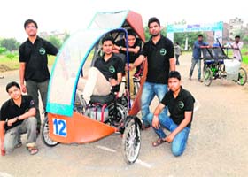 Students from Chameli Devi School of Engineering, Indore, with their vehicle in Chandigarh on Thursday