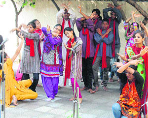 Artistes stage a play to create awareness on road safety. 