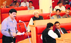 Minister for Law, Justice and Parliamentary Affairs Mir Saifullah addresses the Legislative Council in Srinagar on Thursday. Tribune photo: Amin War