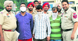 The accused in police custody in Ludhiana on Thursday. Photo: Inderjeet Verma
