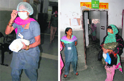 A worker carries the foetus found in a washroom (right) at the General Hospital, Sector 6, Panchkula, on Friday. Tribune photos: Nitin Mittal 