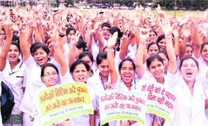 Nursing students participate in an awareness march taken out on the occasion of International Girl Day at 