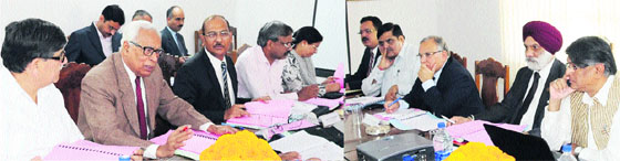 Governor NN Vohra chairing the University Council meeting of the University of Kashmir at Raj Bhawan in Srinagar on Friday. 