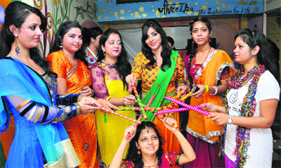 Students of INIFD perform dandia as part of the Navratra celebrations in Jammu on Friday. Tribune Photo: Inderjeet Singh