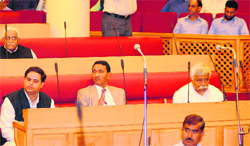 Ministers and members of the Legislative Council on the last day of the ongoing session in Srinagar on Friday. Tribune Photo: Amin War