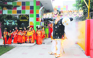 Students of ABC Montessori School celebrate Dasehra on the school premises in Ludhiana on Friday.