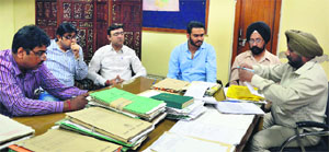A meeting under way at the MC Zone-A office in Ludhiana on Friday.