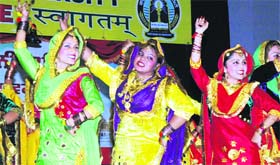 Students perform gidda at Guru Nanak Dev University in Amritsar on Saturday.